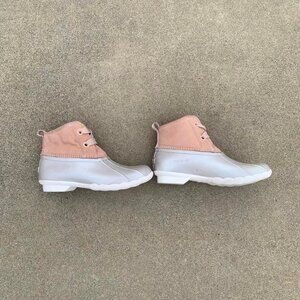 Pink and white duck boots